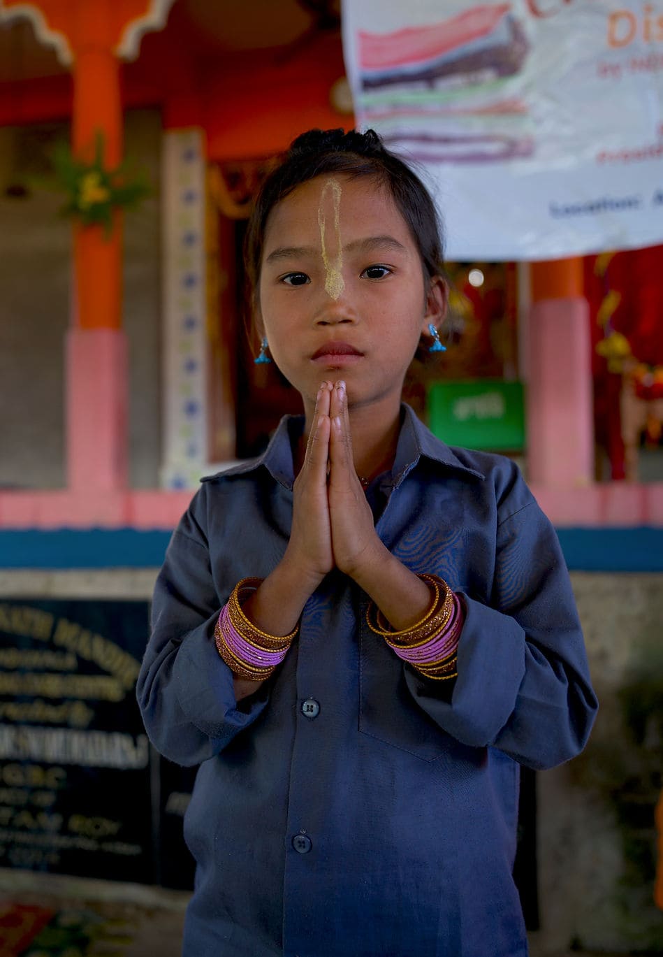 Tribal child praying